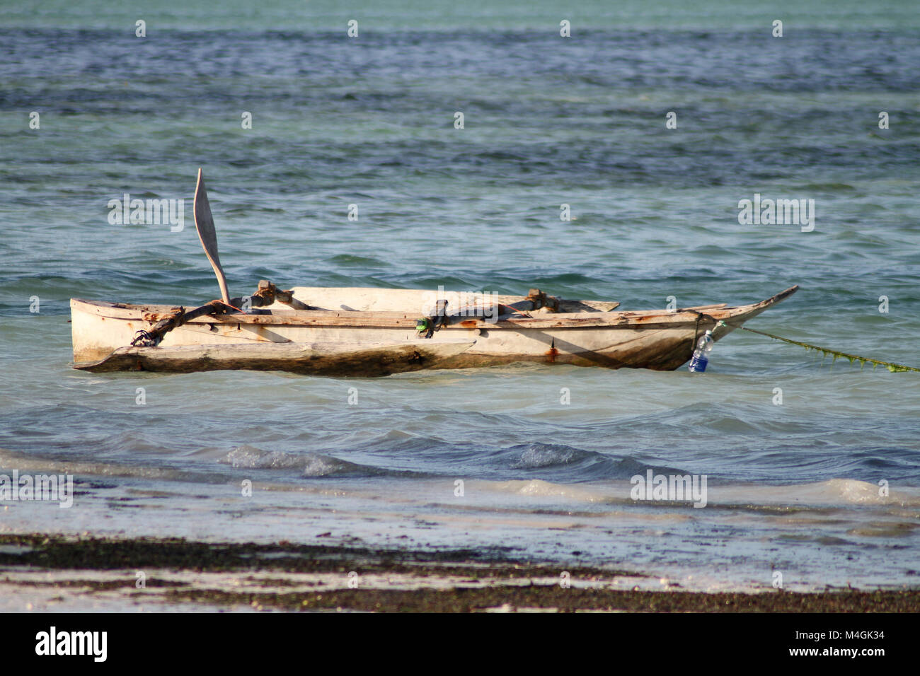 Dhow on the beach, Kiwengwa beach, Zanzibar, Tanzania Stock Photo