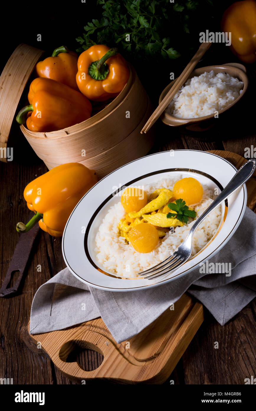 chicken in a curry cream sauce Stock Photo Alamy