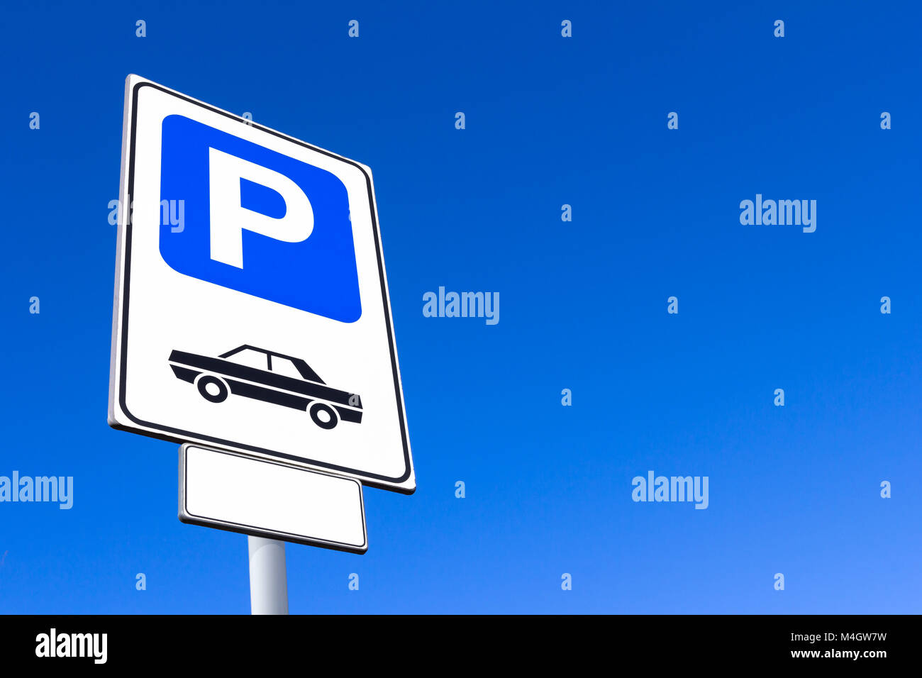 Parking sign with blue sky Stock Photo - Alamy