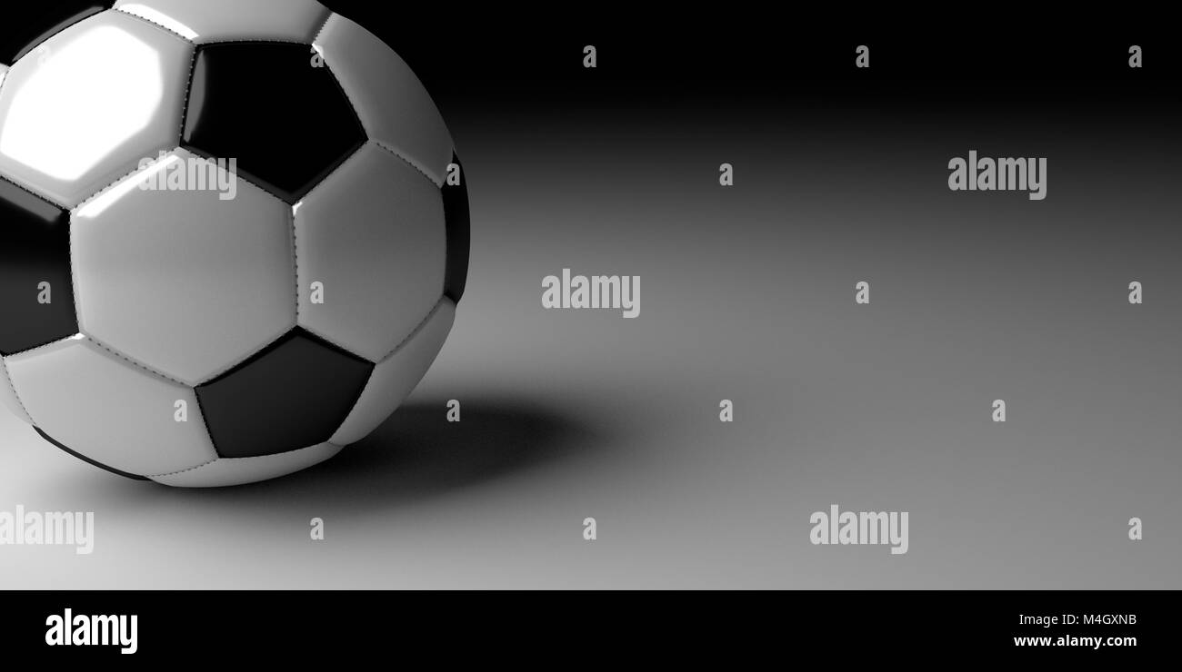 Soccer ball on white surface with black fading in the background. Stock Photo