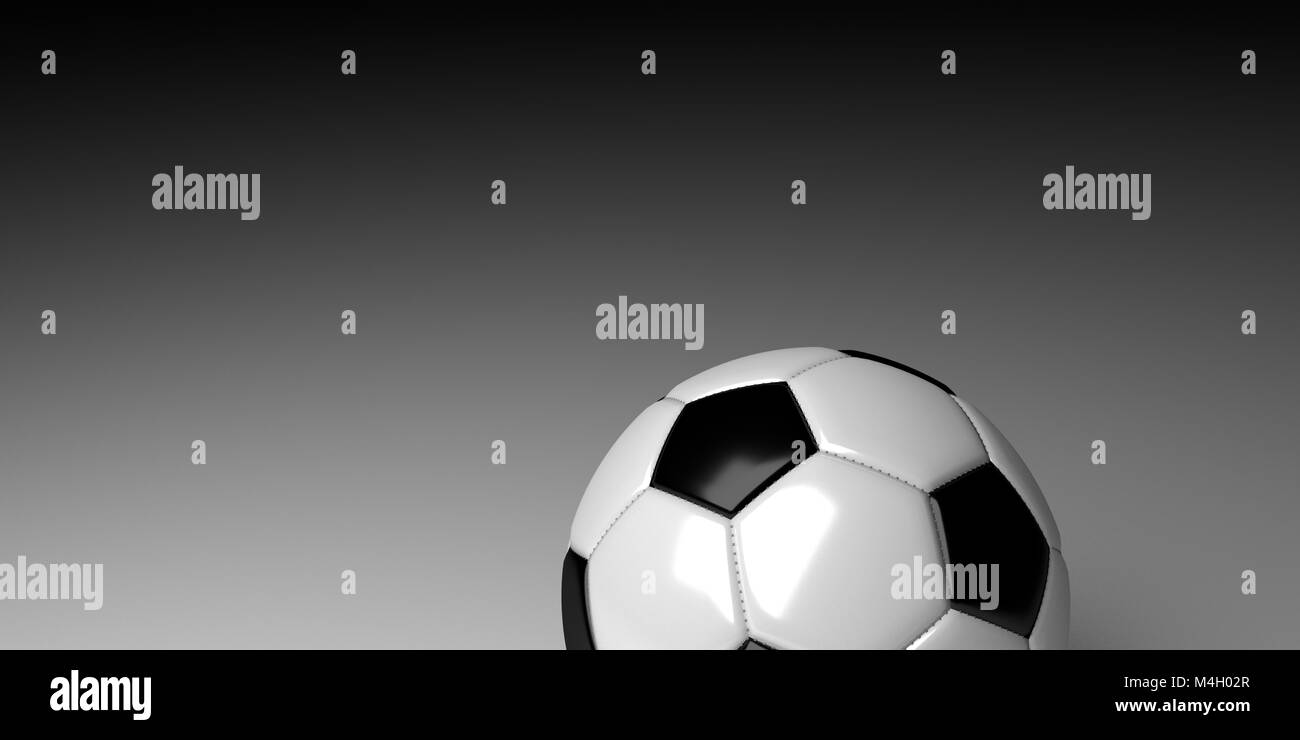 Soccer ball on white surface with black fading in the background. Stock Photo