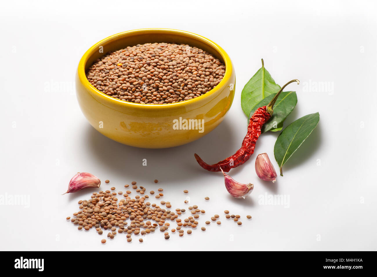 A bowl of lentils with chilli, garlic and laurel leaves. Still life of slow food diet mediterranean.  Abruzzo, italy, europe Stock Photo