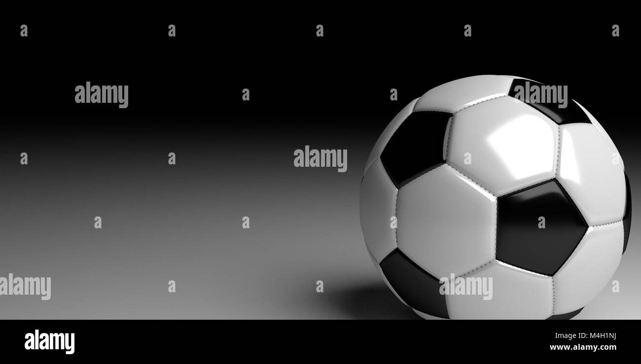 Soccer ball on white surface with black fading in the background. Stock Photo