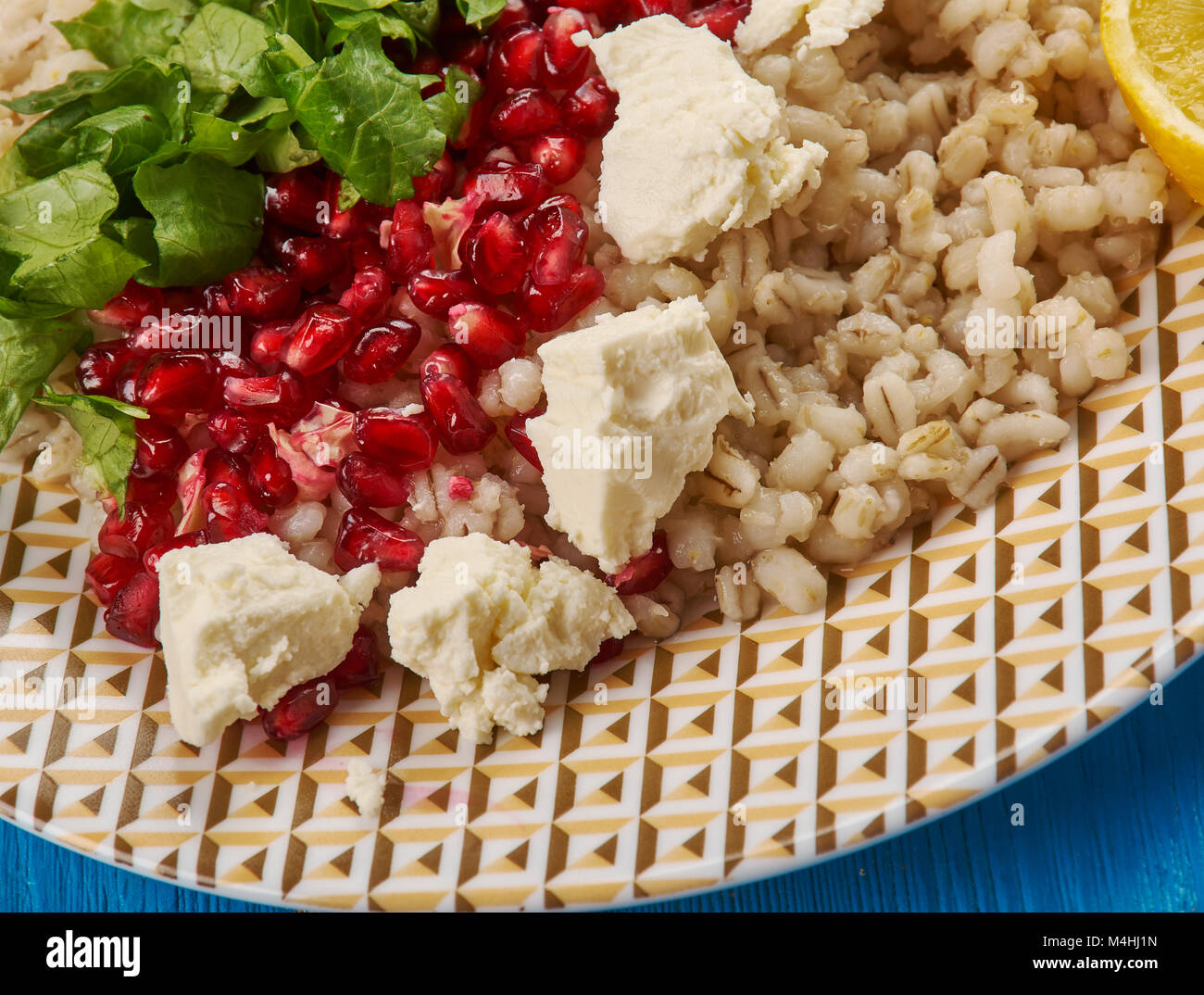 Egyptian Cuisine Traditional Egyptian Barley Salad With Pomegranate Vinaigrette Feta Cheese Stock Photo Alamy