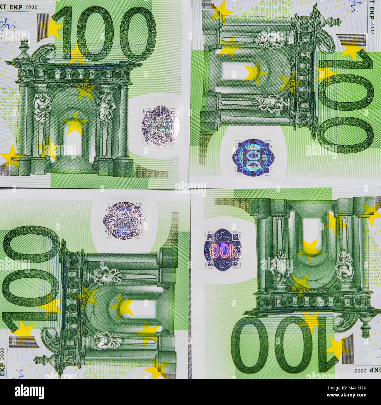 Pile of one hundred euro banknotes (100 EUR). Close up Stock Photo - Alamy