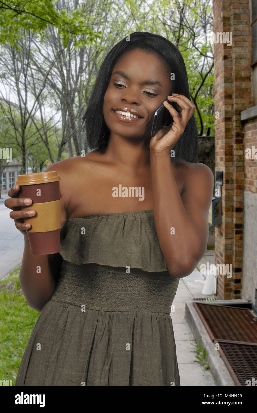 Pretty black lady holding hi-res stock photography and images - Alamy