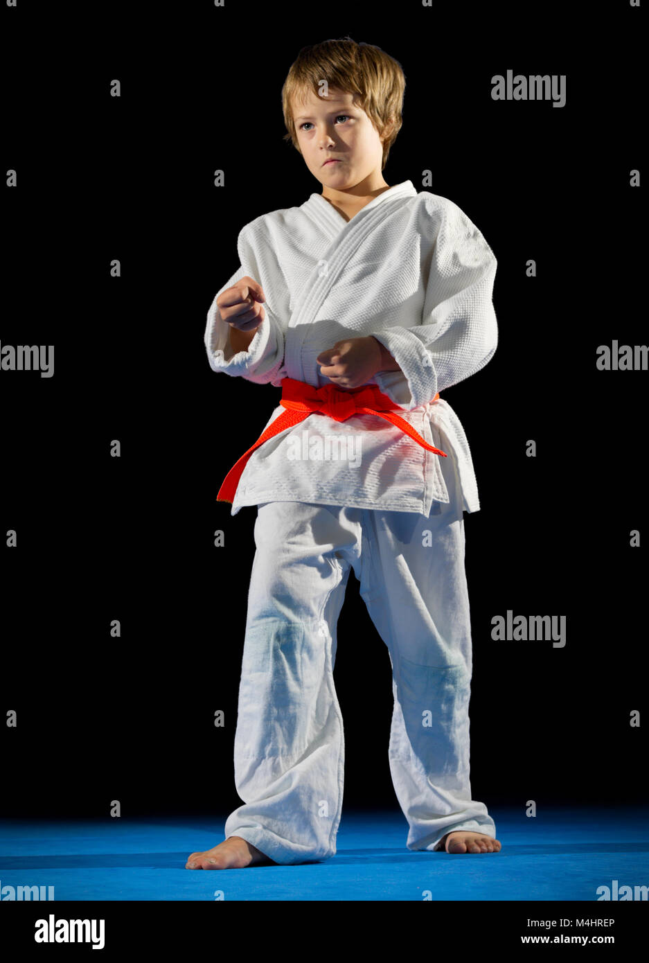 Boy martial arts fighter isolated Stock Photo Alamy