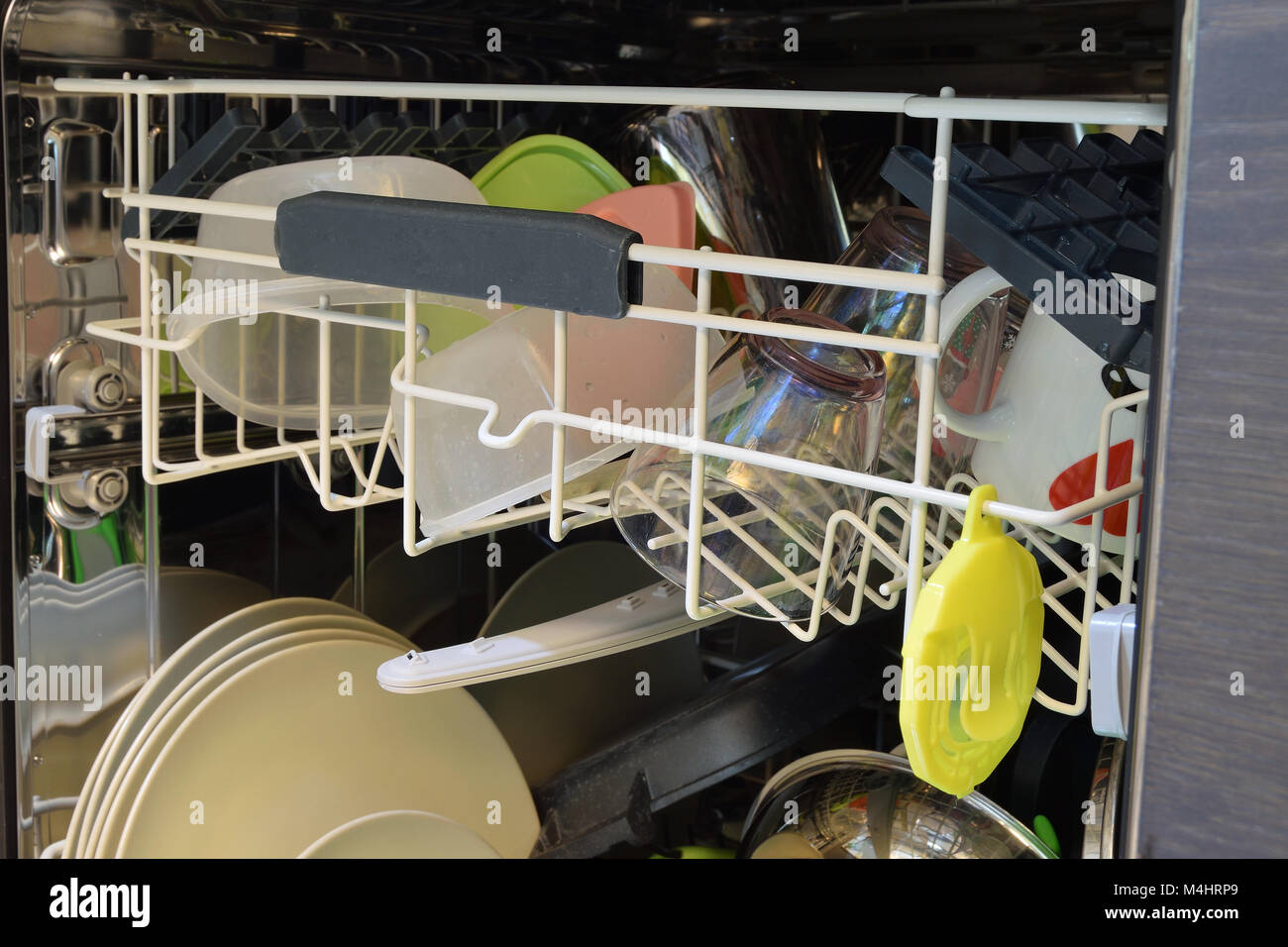 Dishware clean after washing in the dishwasher Stock Photo Alamy