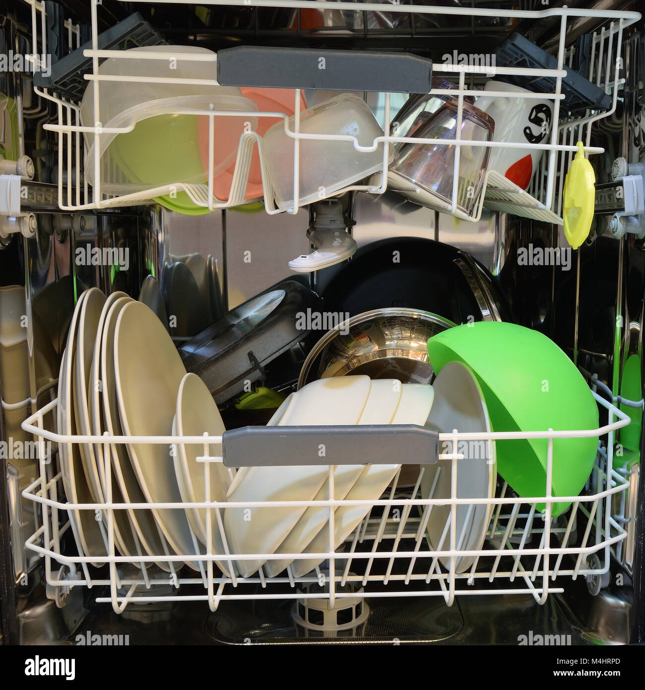 Dishware clean after washing in the dishwasher Stock Photo Alamy