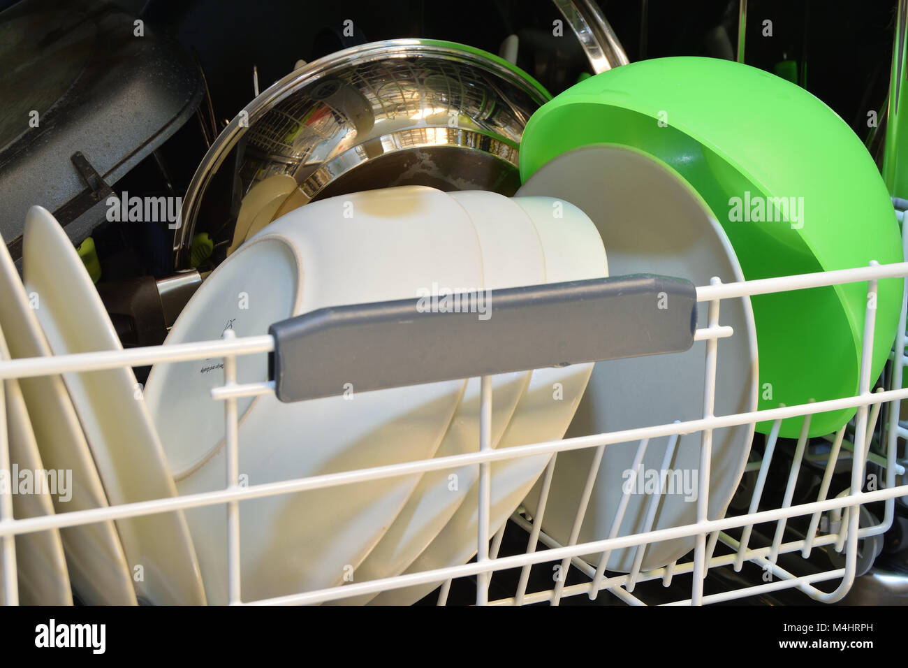 Dishware clean after washing in the dishwasher Stock Photo Alamy
