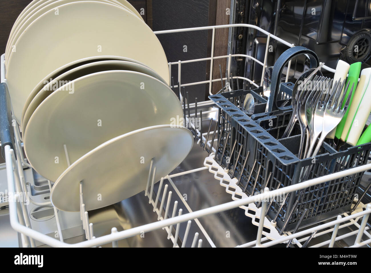 Dishware clean after washing in the dishwasher Stock Photo Alamy