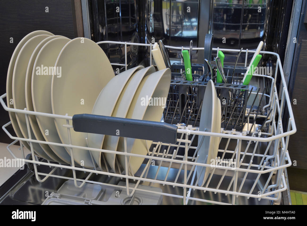 Dishware clean after washing in the dishwasher Stock Photo Alamy