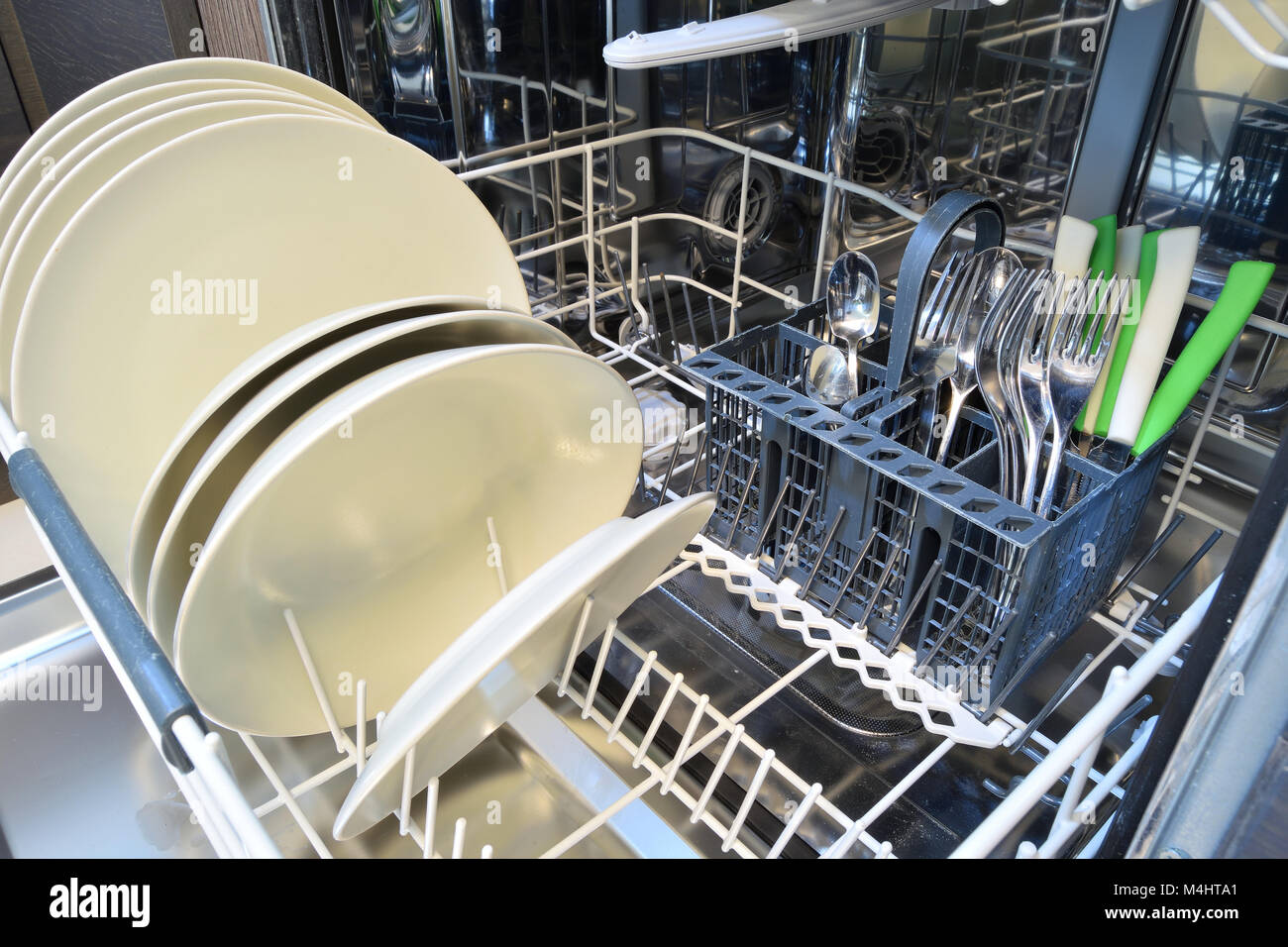 Dishware clean after washing in the dishwasher Stock Photo Alamy