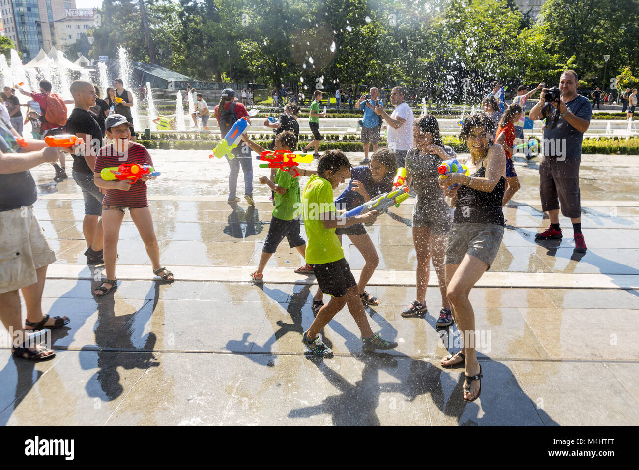Water gun fight summer Stock Photo Alamy