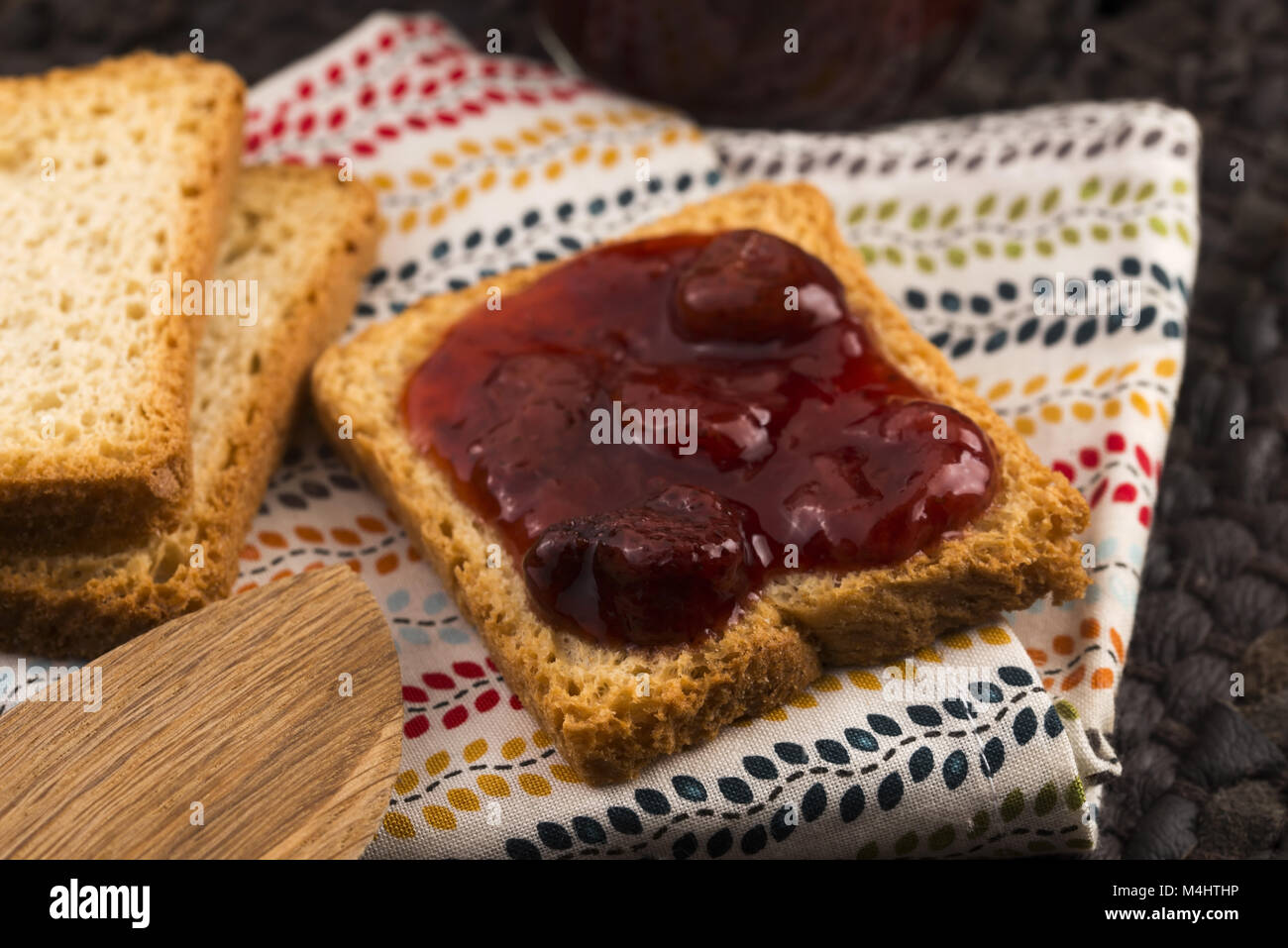 Breakfast of cherry jam on toast Stock Photo Alamy