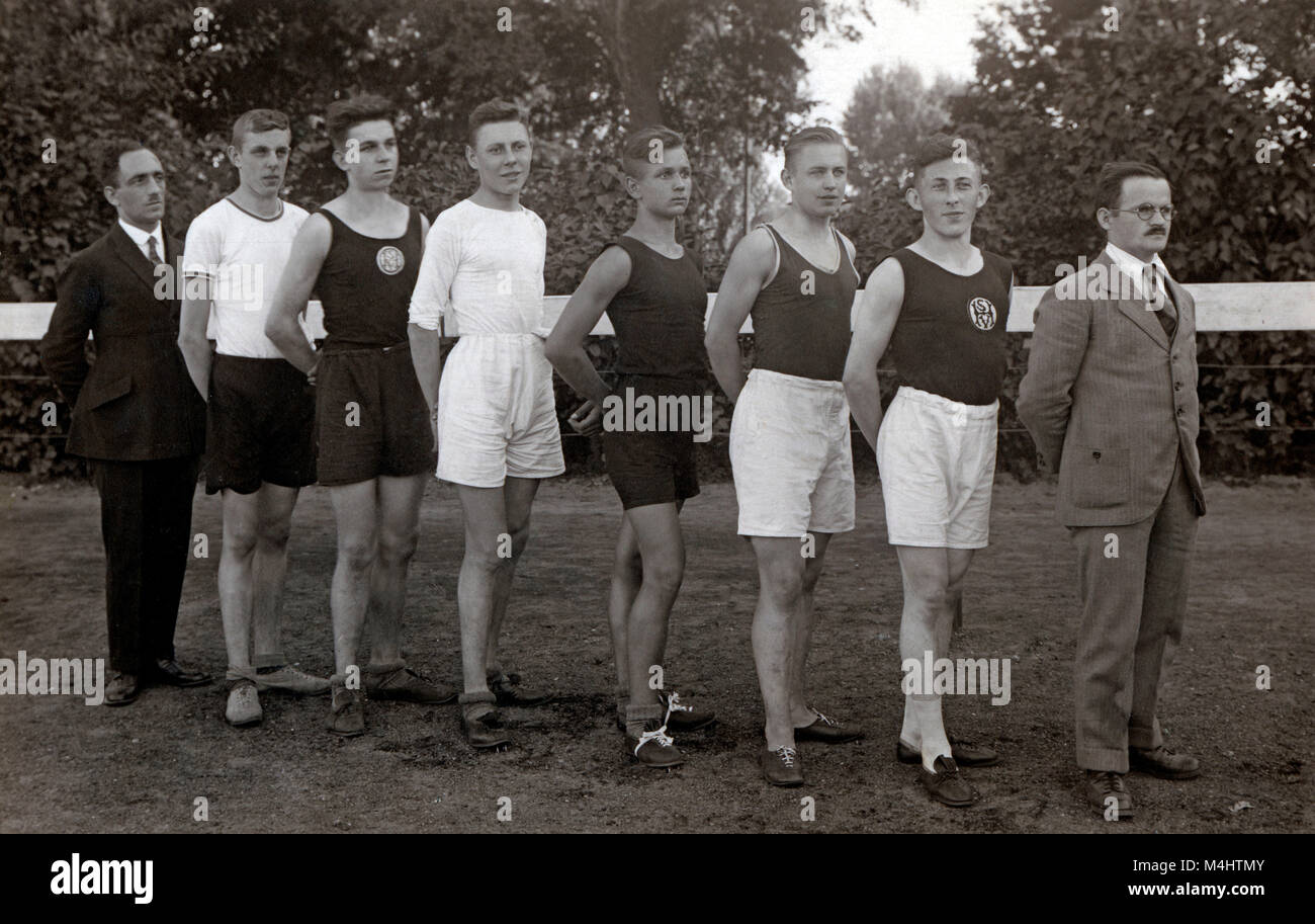 Six young sportsmen and women with coach, ca. 1929, 1920s, exact ...