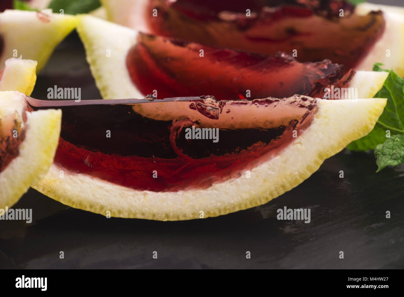 Lemon vodka blackcurrant jelly (jello) shots Stock Photo Alamy