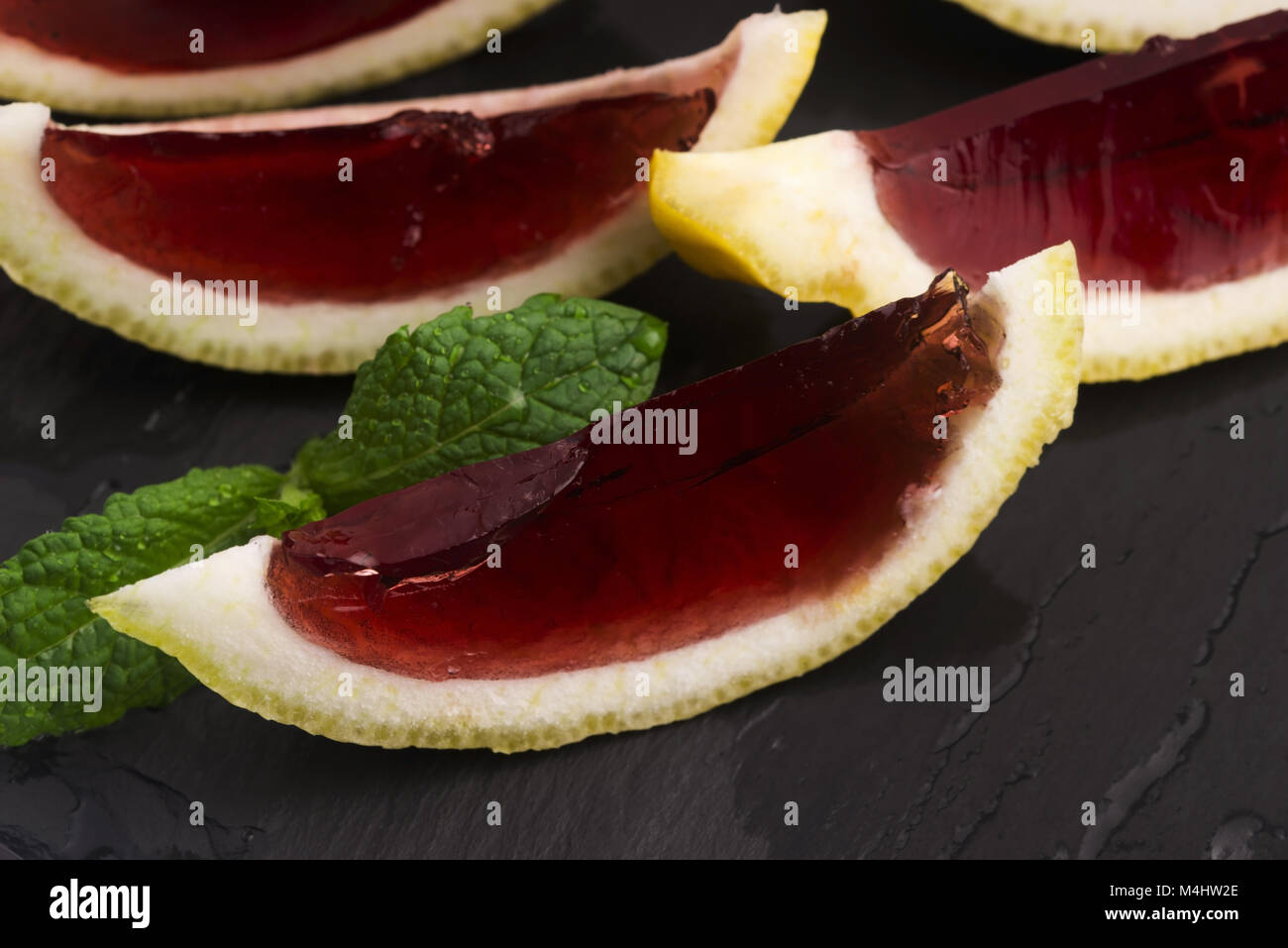 Lemon vodka blackcurrant jelly (jello) shots Stock Photo Alamy