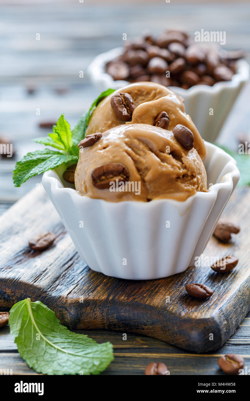 Homemade coffee ice cream and mint leaves. Stock Photo
