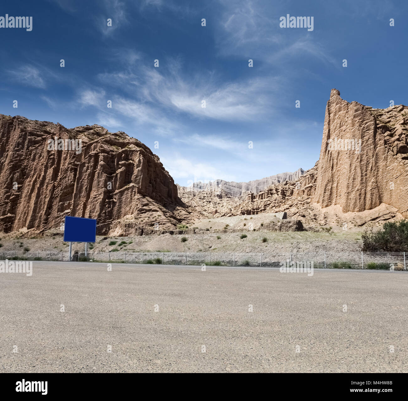 empty asphalt road with xinjiang geological landscape Stock Photo