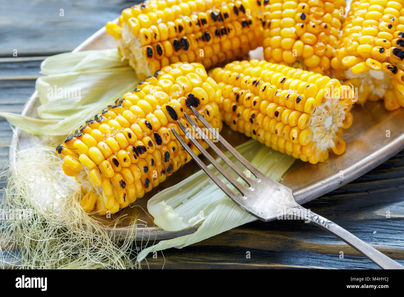 Sweet corn grilled with salt. Stock Photo