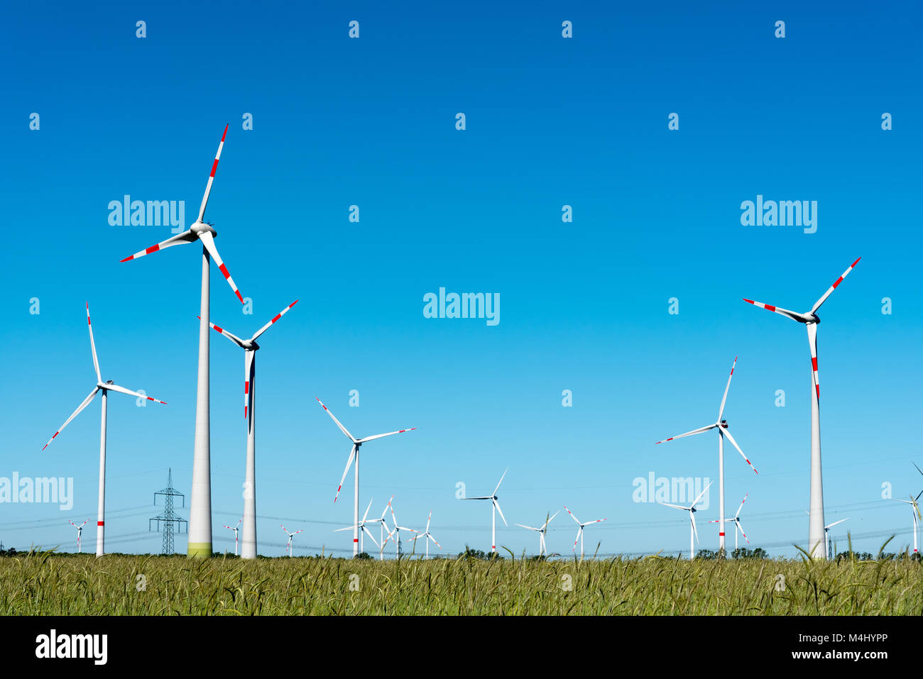 Wind power plant with many windmills seen in Germany Stock Photo Alamy