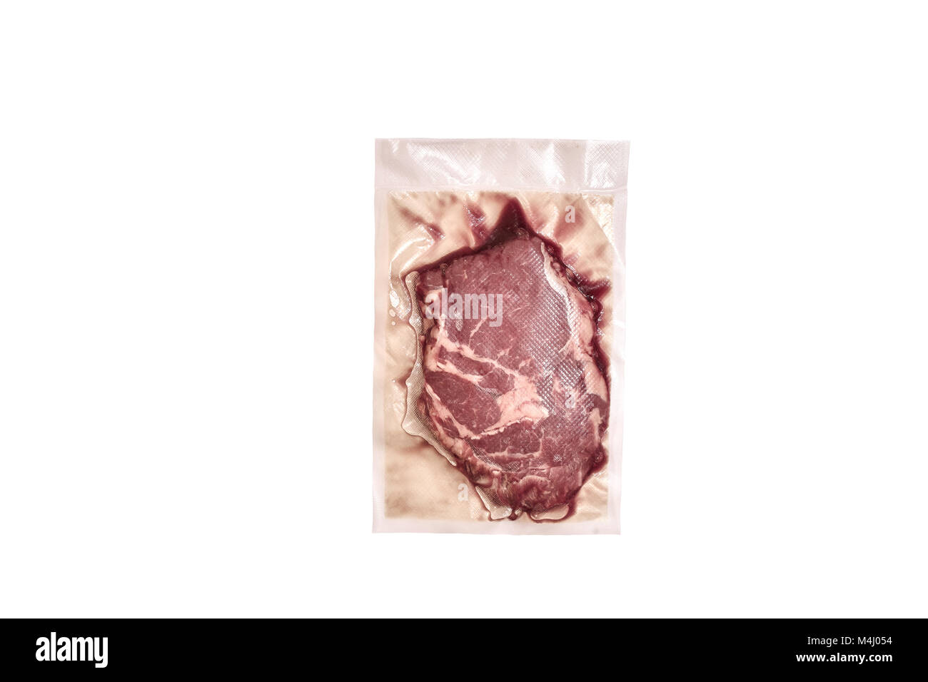 Unopened pack of one raw beef steaks isolated on white background