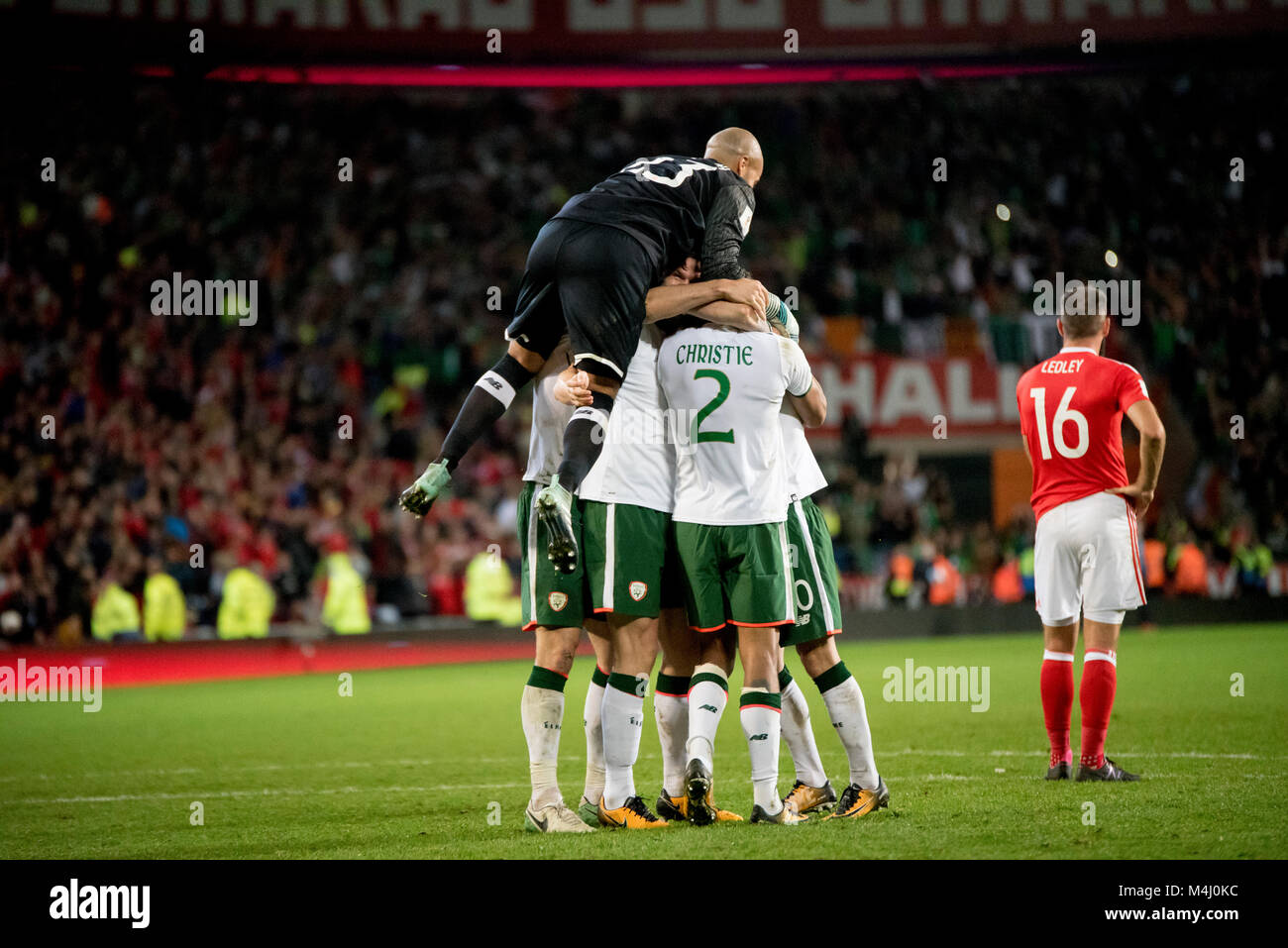 Ireland football team celebrate in Cardiff against Wales for the crucial World Cup qualifier Stock Photo