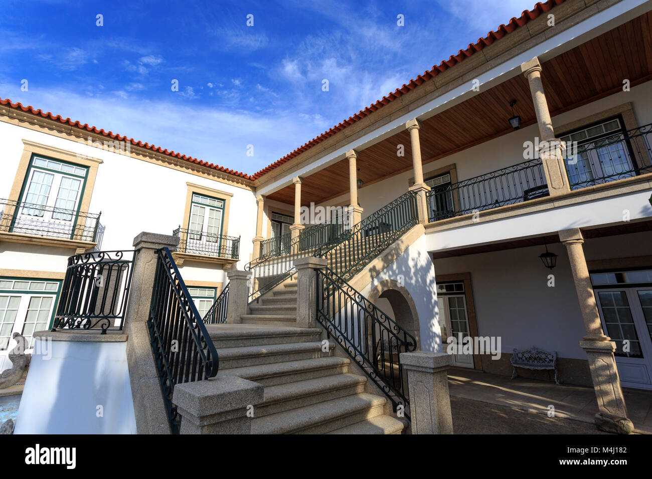 Classic house with verandah and granite staircase, in Amarante