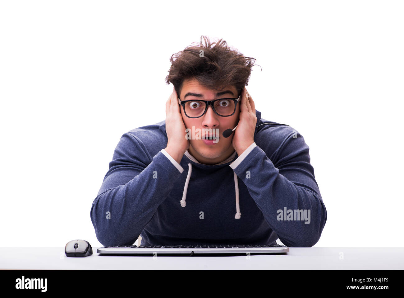 Funny nerd man working on computer isolated on white Stock Photo