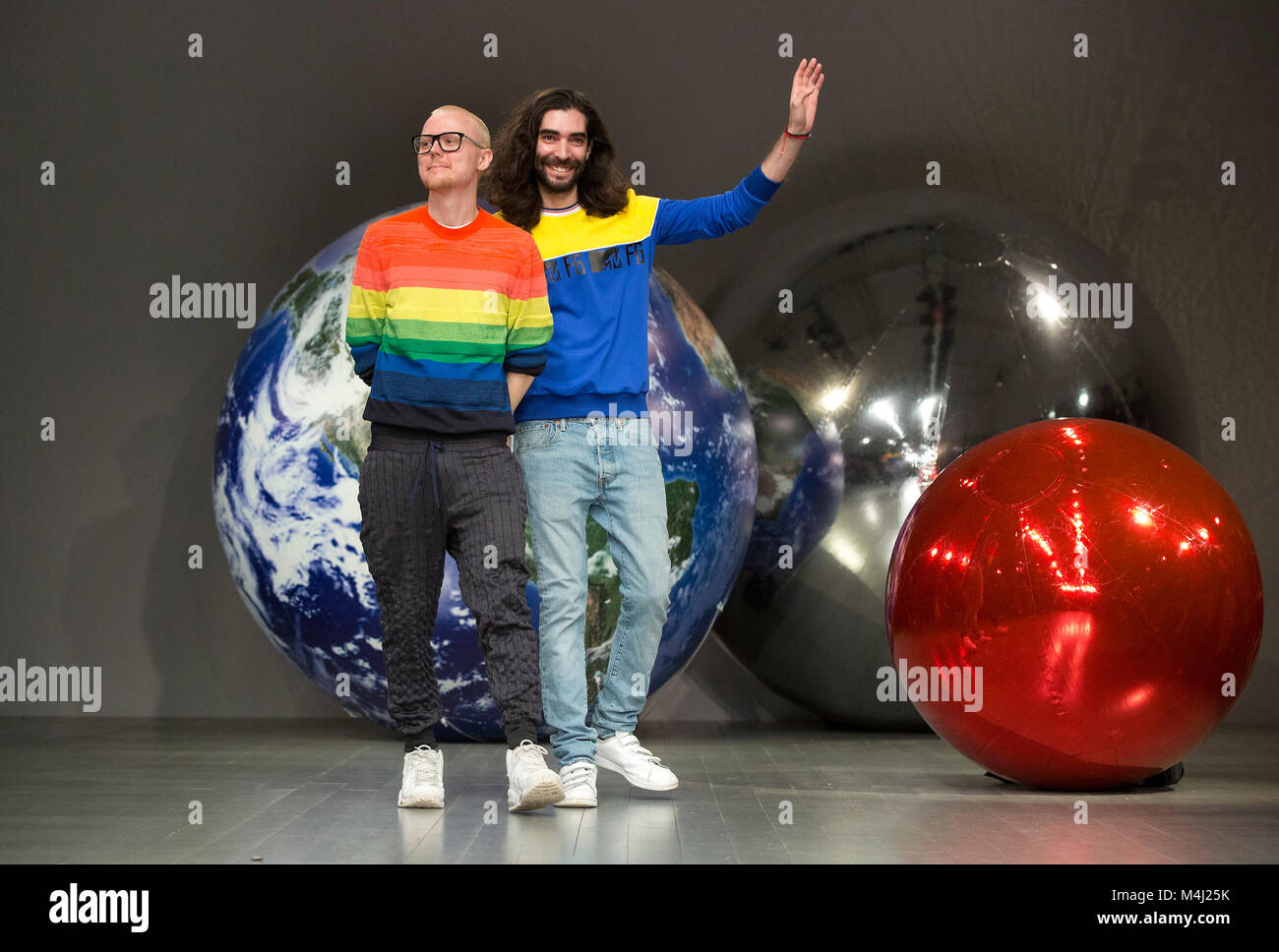 Designers Fyodor Podgorny and Golan Frydman acknowledge the audience after his Autumn/Winter 2018 London Fashion Week show at BFC Showspace, London. PRESS ASSOCIATION. Picture date: Friday February 16, 2018. Photo credit should read: Isabel Infantes/PA Wire Stock Photo