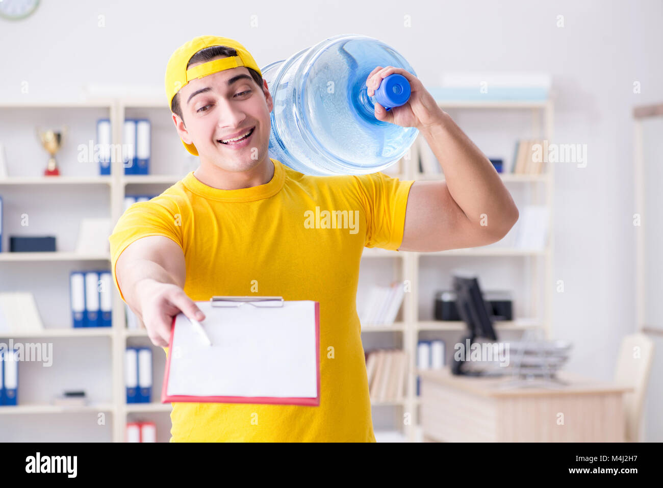 Man carrying water jug hires stock photography and images Alamy