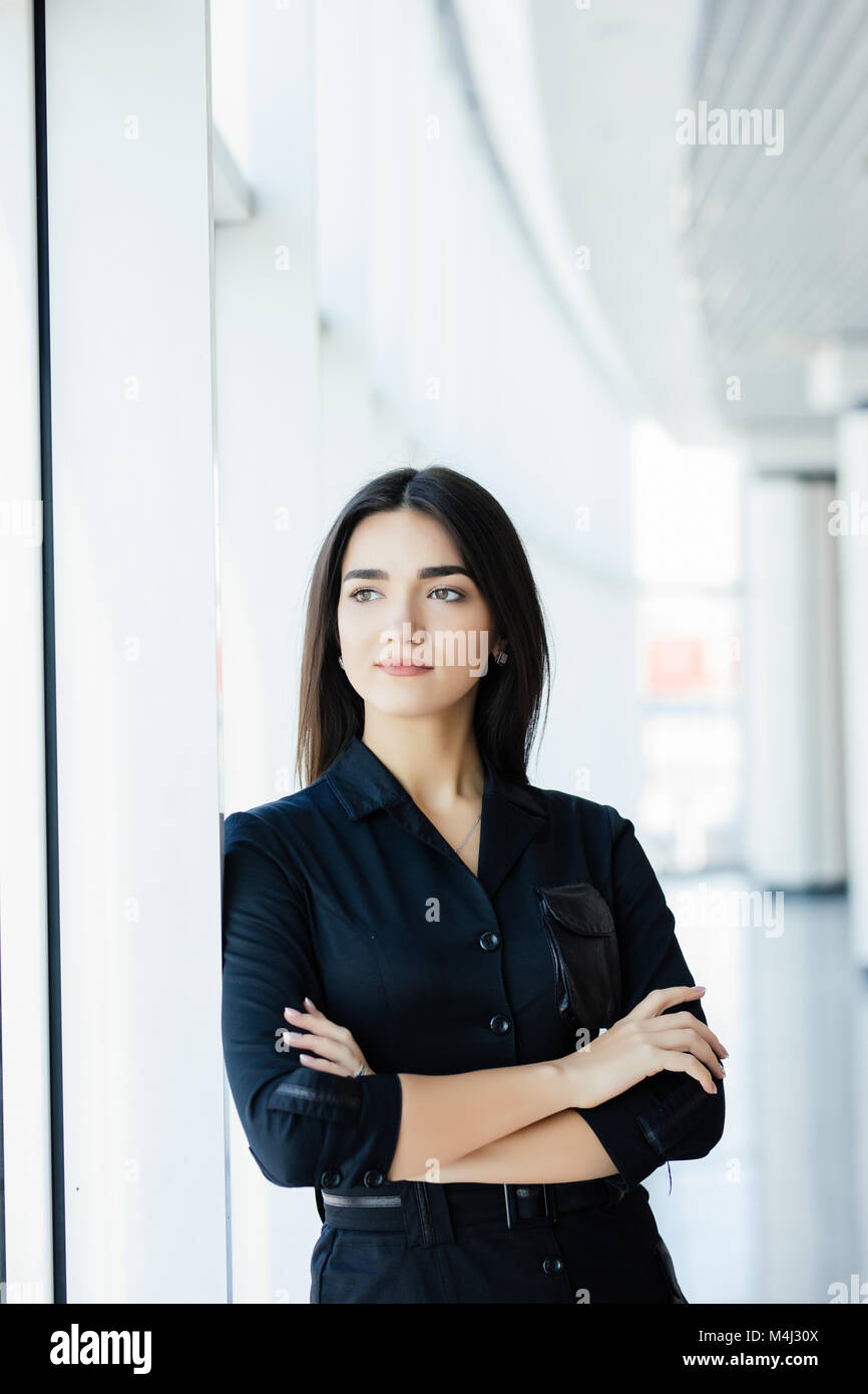 Portrait of young business woman in the office Stock Photo - Alamy