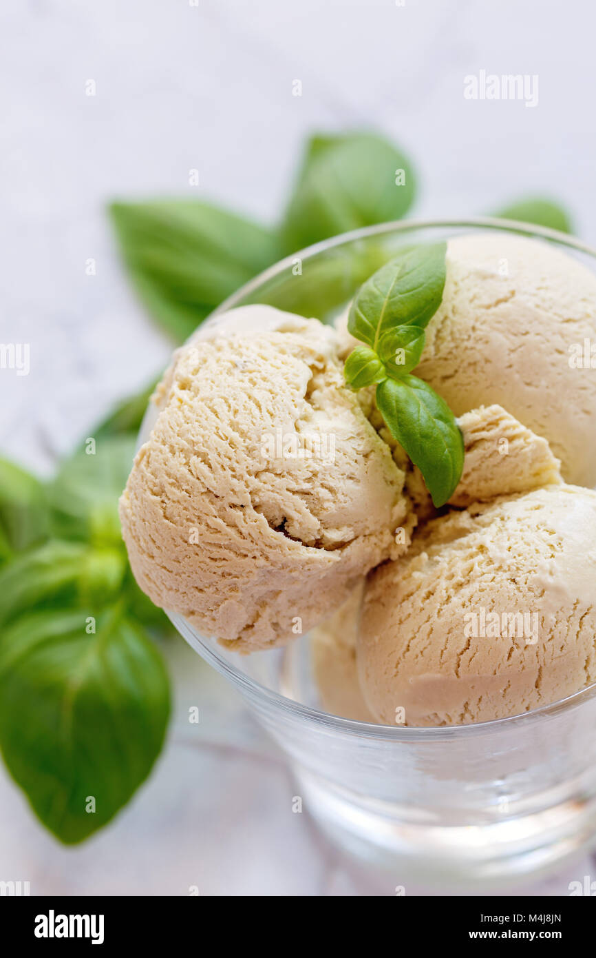 Basil ice cream in a glass bowl Stock Photo Alamy