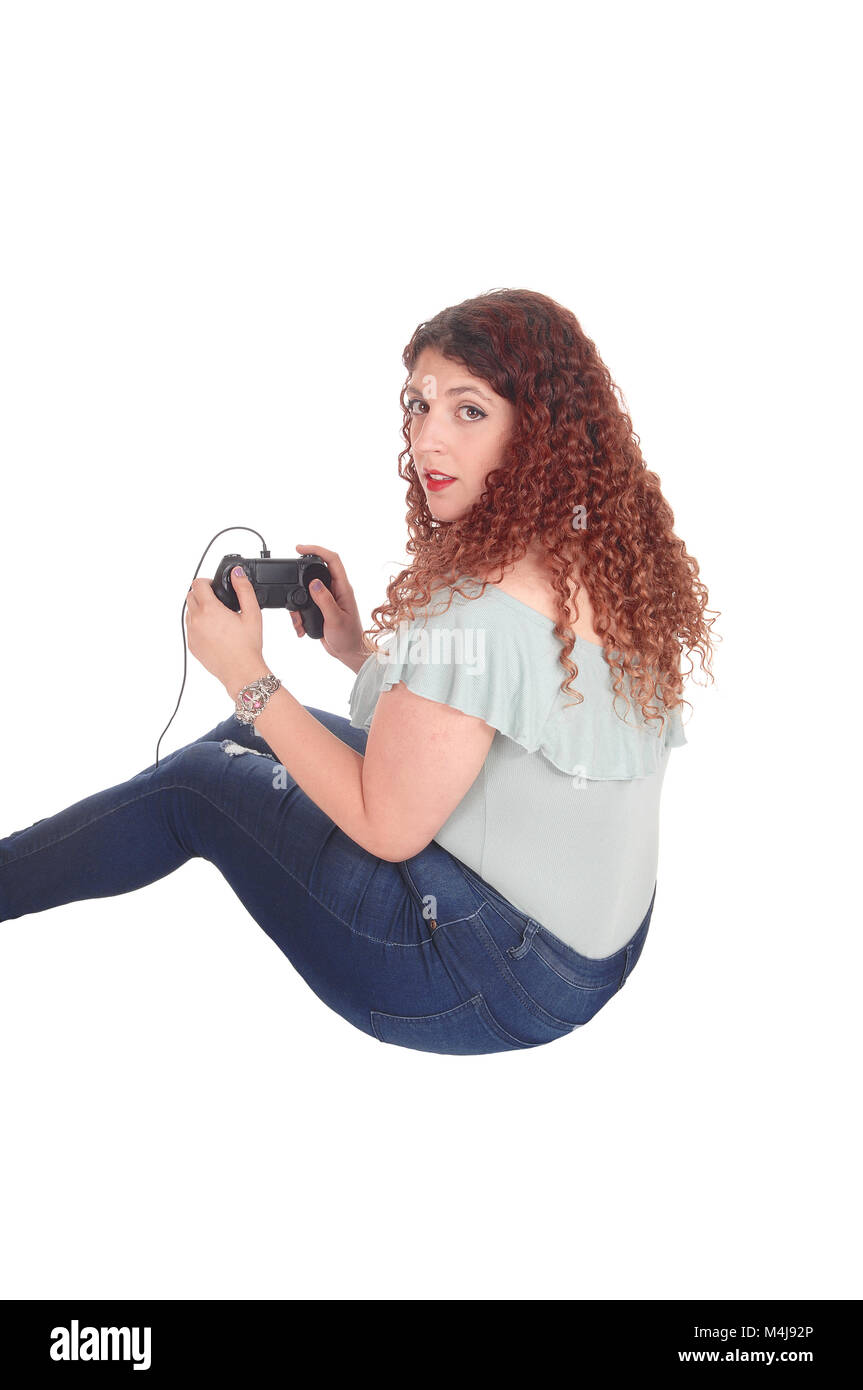 Woman playing her video game. Stock Photo