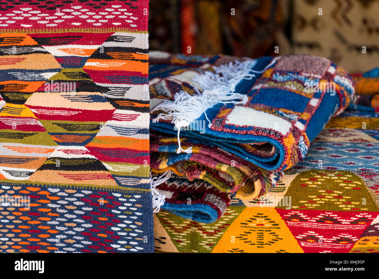 Colorful Moroccan traditional handmade carpets with decorative patterns Stock Photo