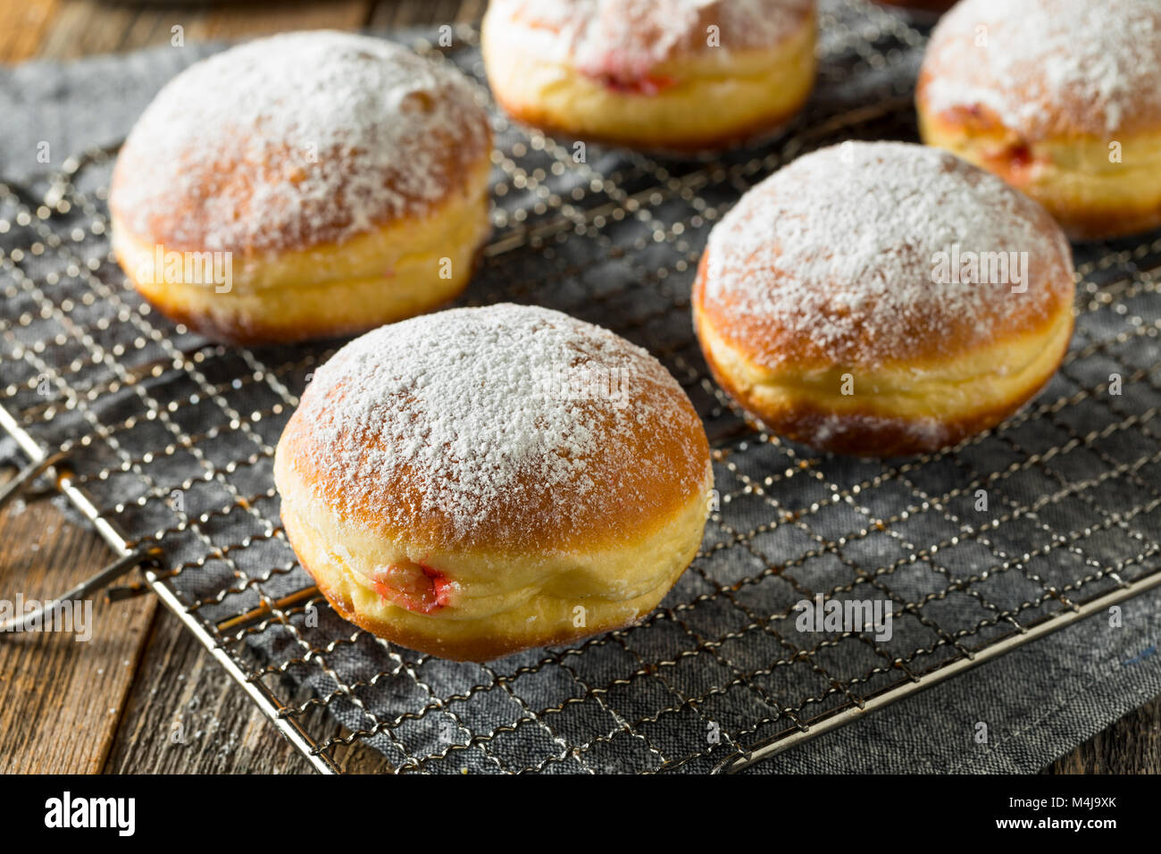 Gourmet Homemade Polish Paczki Donuts with Jelly Filling Stock Photo