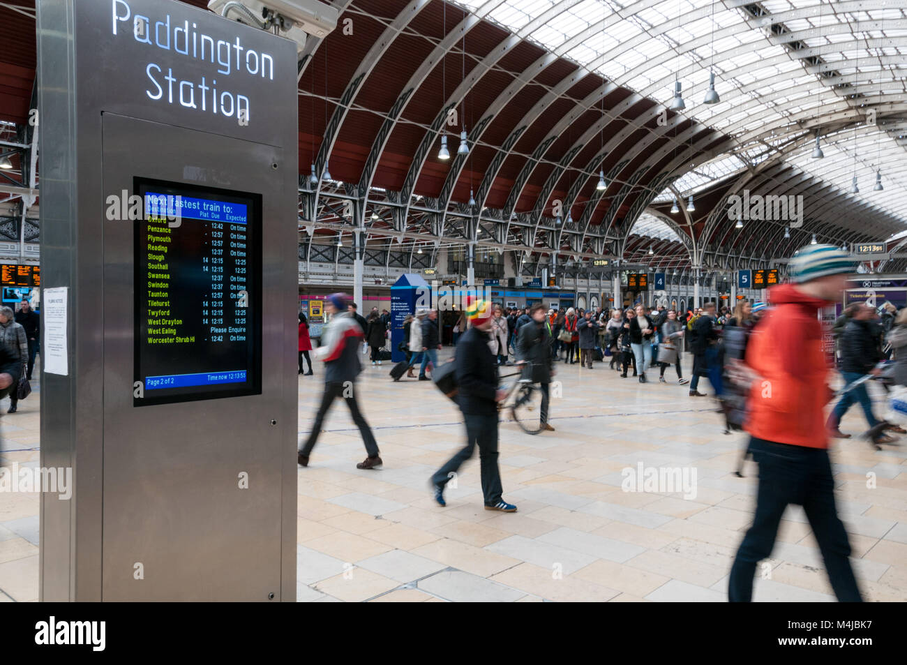 Train times information screens at Paddington station, London, United