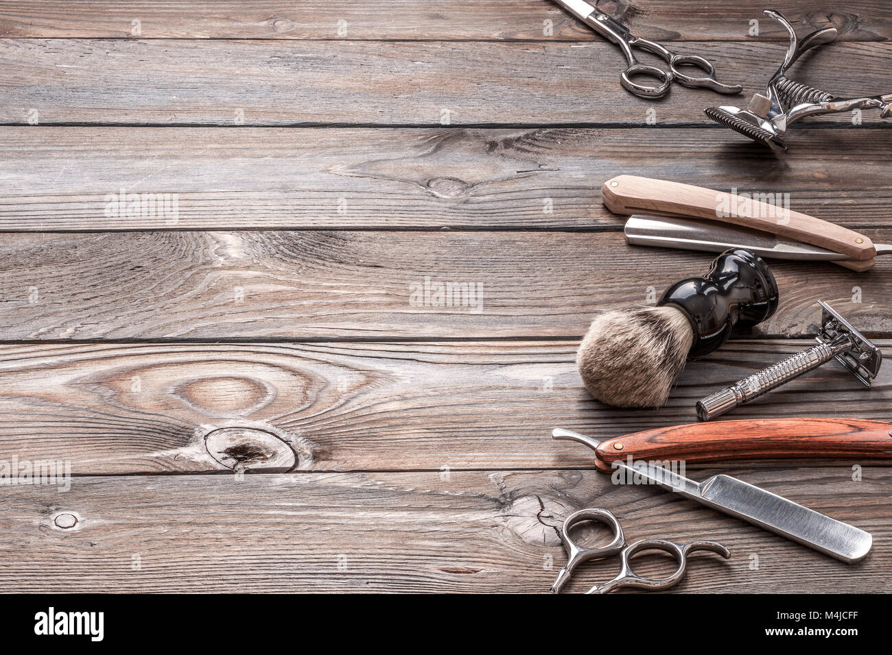 Vintage barber shop tools on wooden background Stock Photo - Alamy
