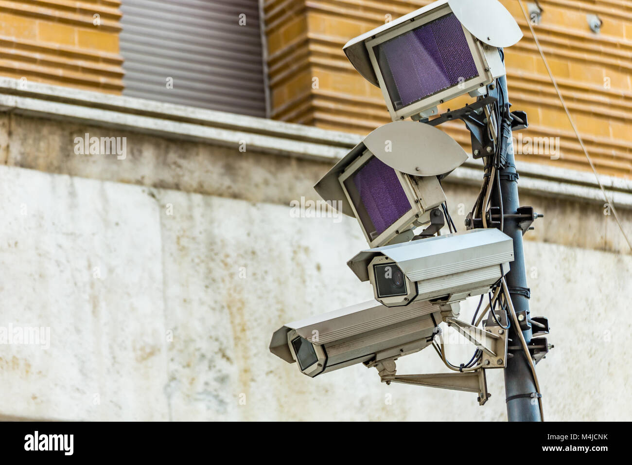 cameras of electronic surveillance system supervise the entrances to the  Limited Traffic Area of historical center in Italian city Stock Photo -  Alamy