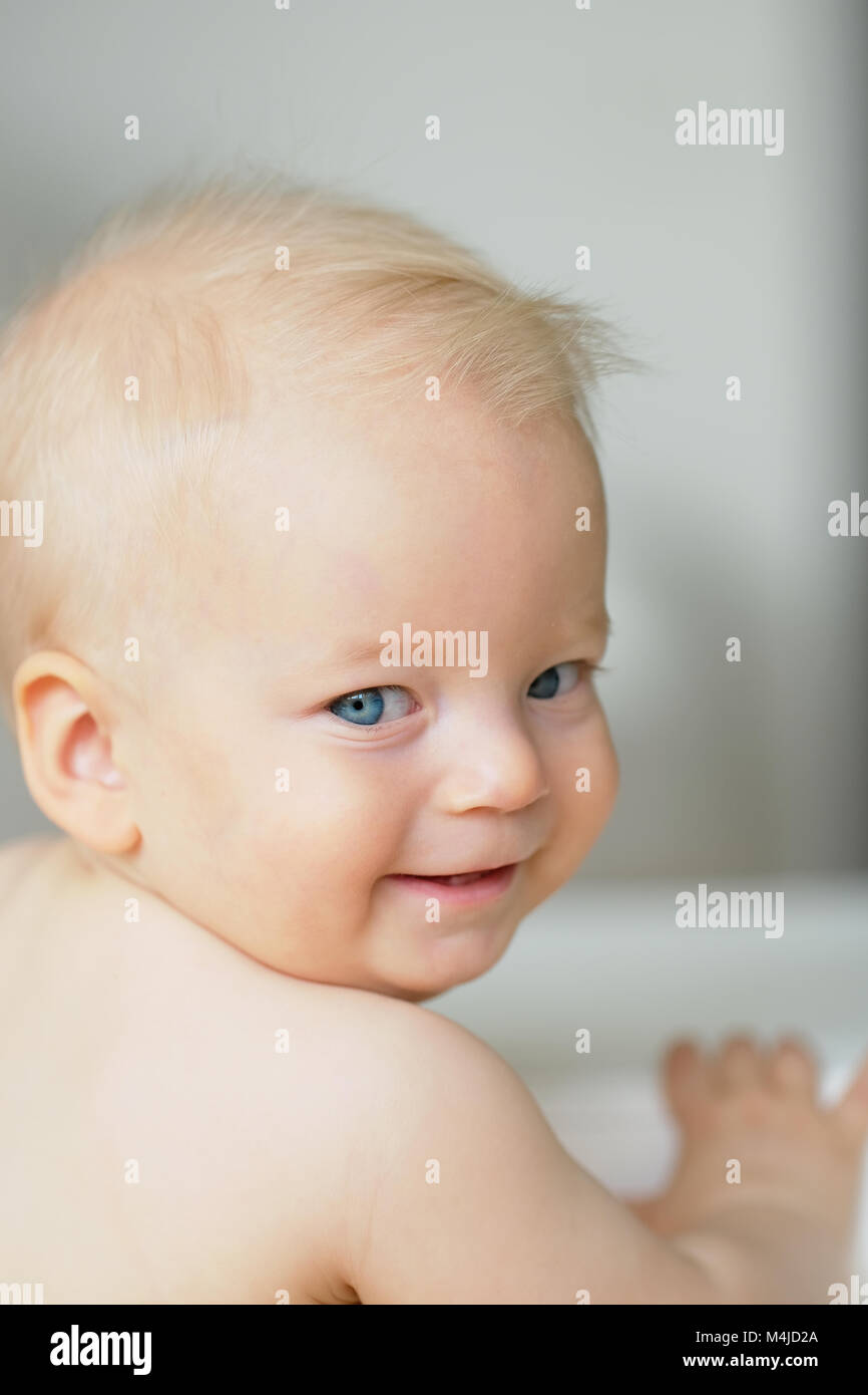 Baby boy with blue eyes Stock Photo Alamy