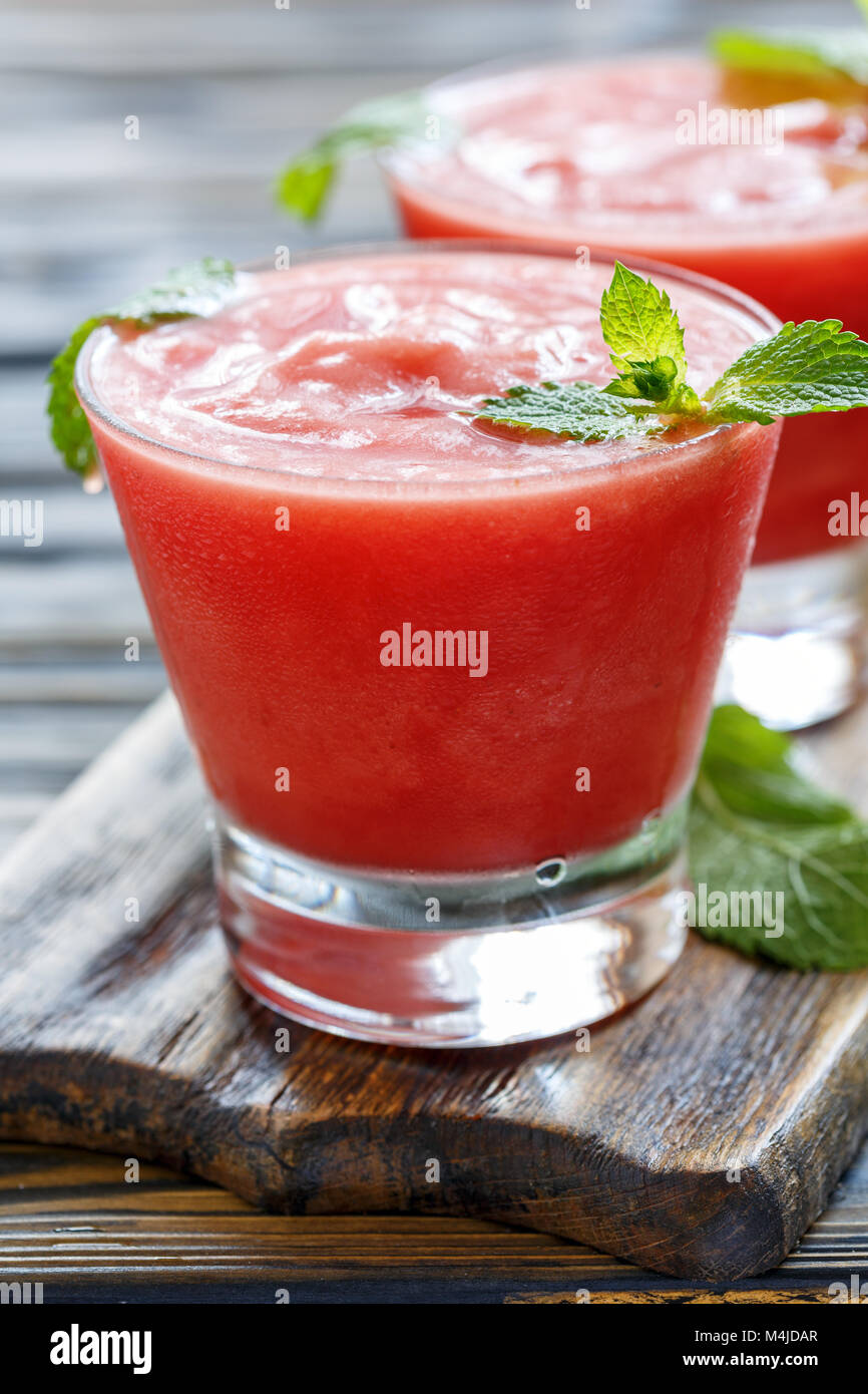 Watermelon smoothie and mint leaves. Stock Photo