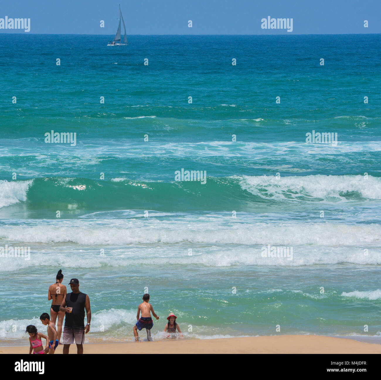 A family playing in the Mediterranean Sea Stock Photo