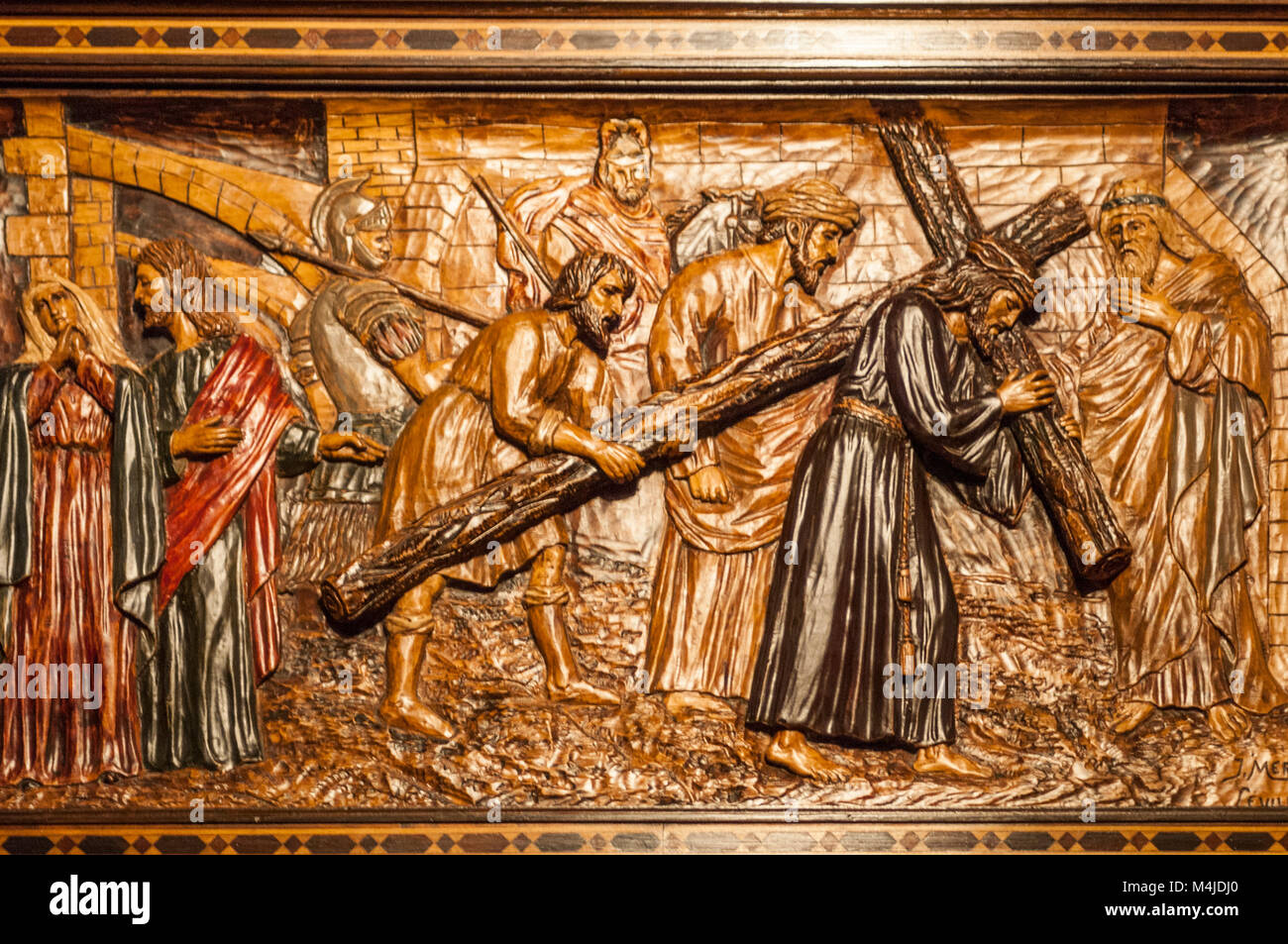 Detail of the wood carving of a scene of the passion of Christ of ...