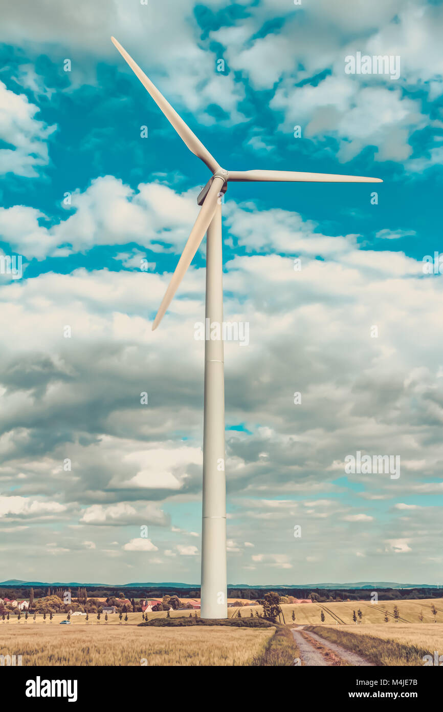 Wind turbine with blue sky Stock Photo - Alamy