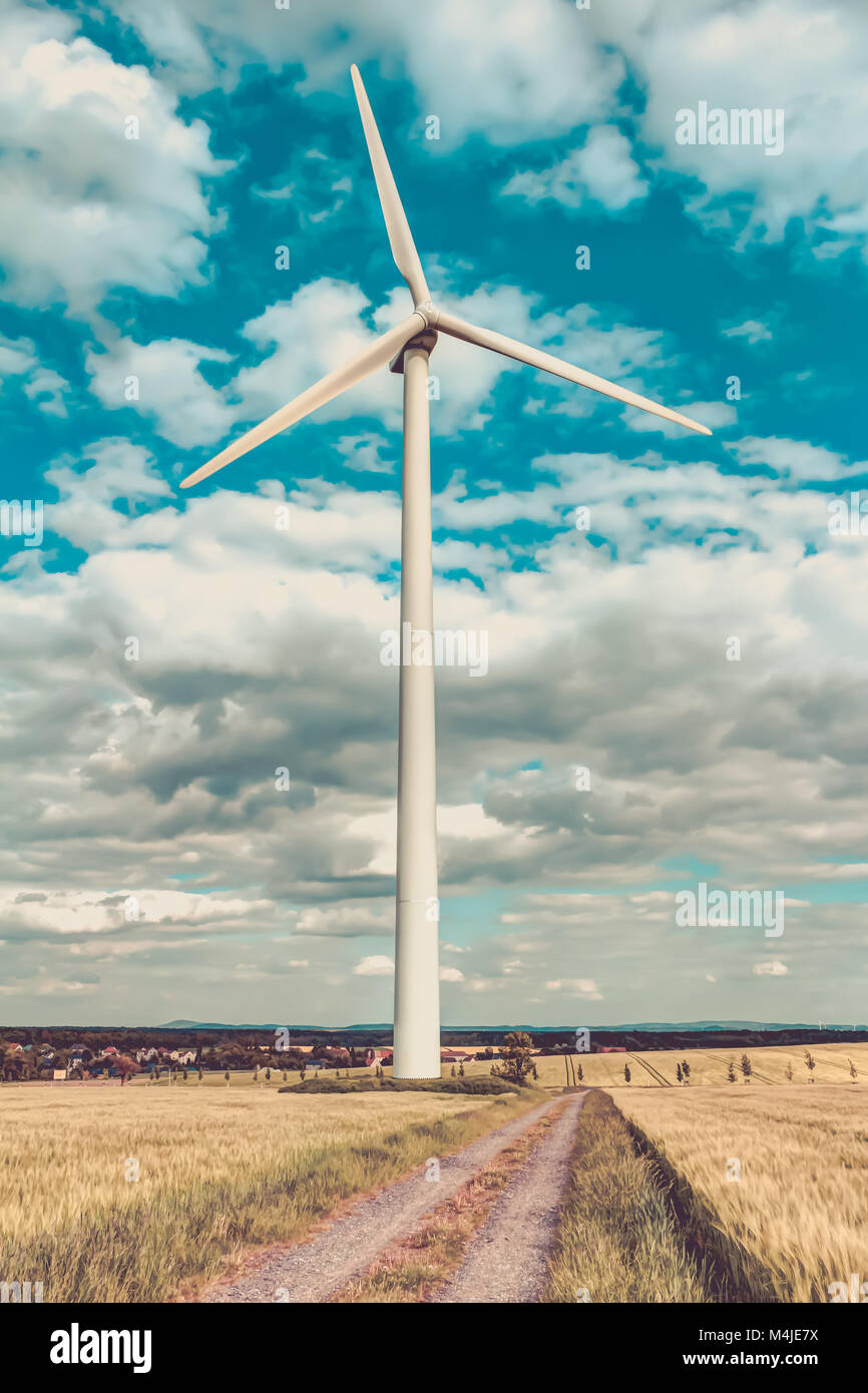 Wind turbine with blue sky Stock Photo - Alamy