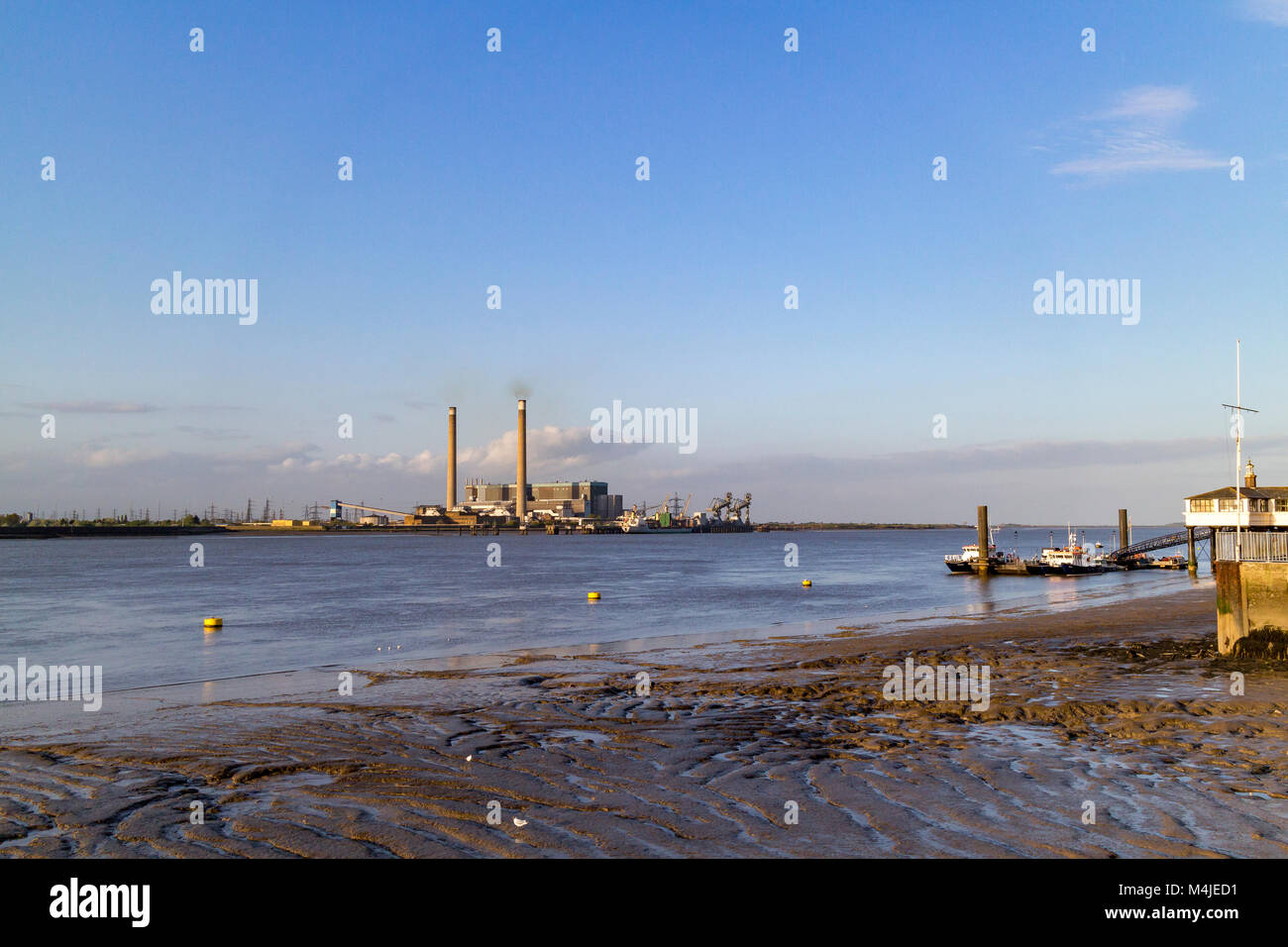 Views along the River Thames waterfront at low tide in the summer at