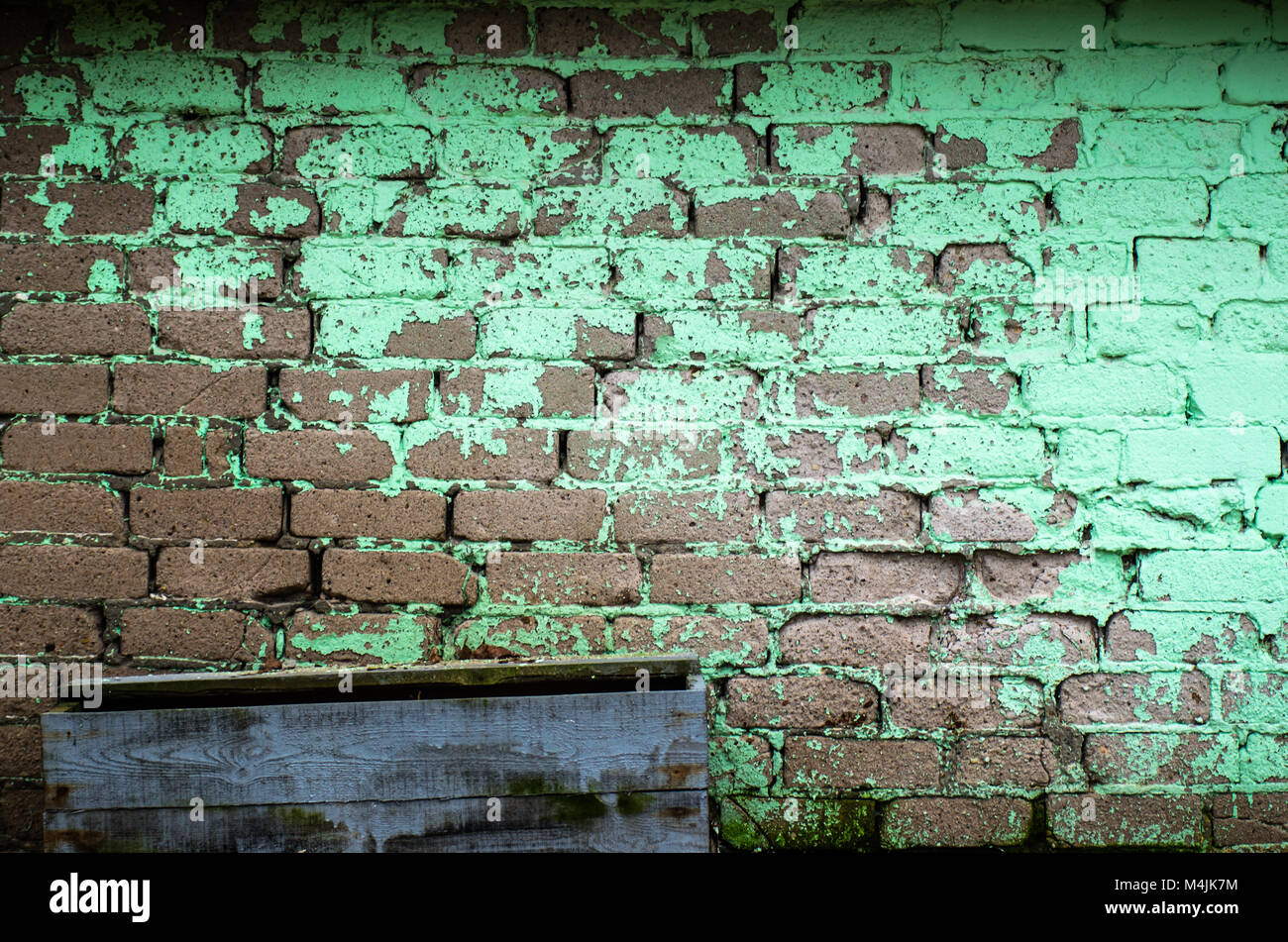 Background of old vintage dirty brick wall with peeling plaster ...