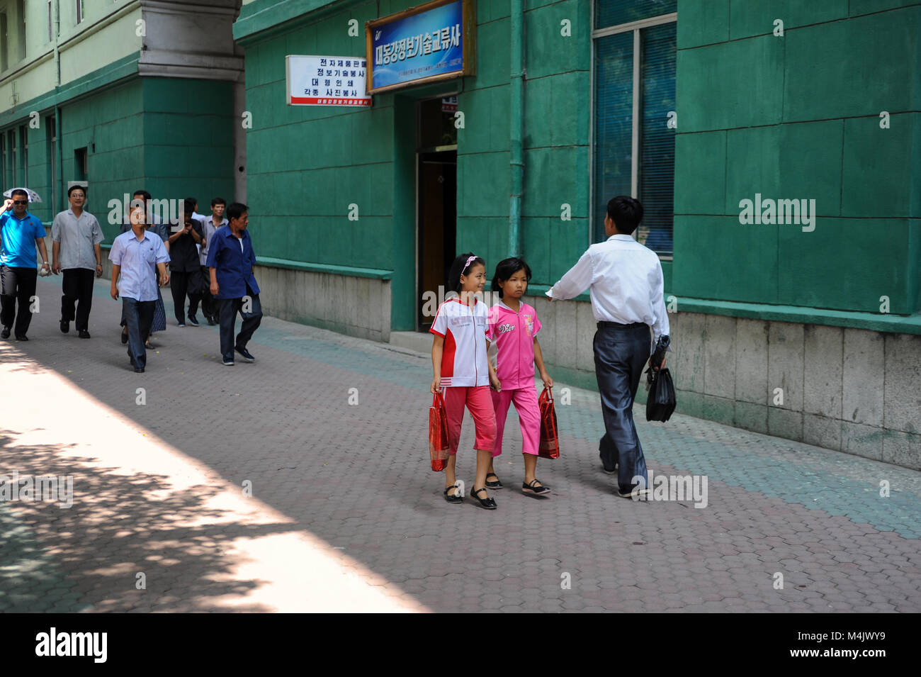 08.08.2012, Pyongyang, North Korea, Asia - Pedestrians in central Pyongyang. Stock Photo