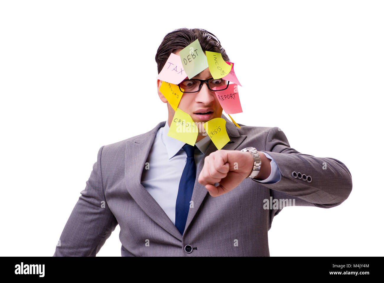 Businessman with many reminders isolated on white Stock Photo - Alamy